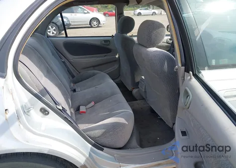 2001 Toyota Corolla Le from USA, damaged, VIN 2T1BR12E41C426052